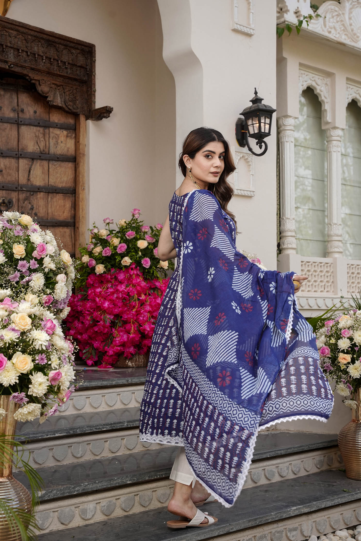 printed  sleeveless  anarkali  with printed  white  lace dupatta  and pant.